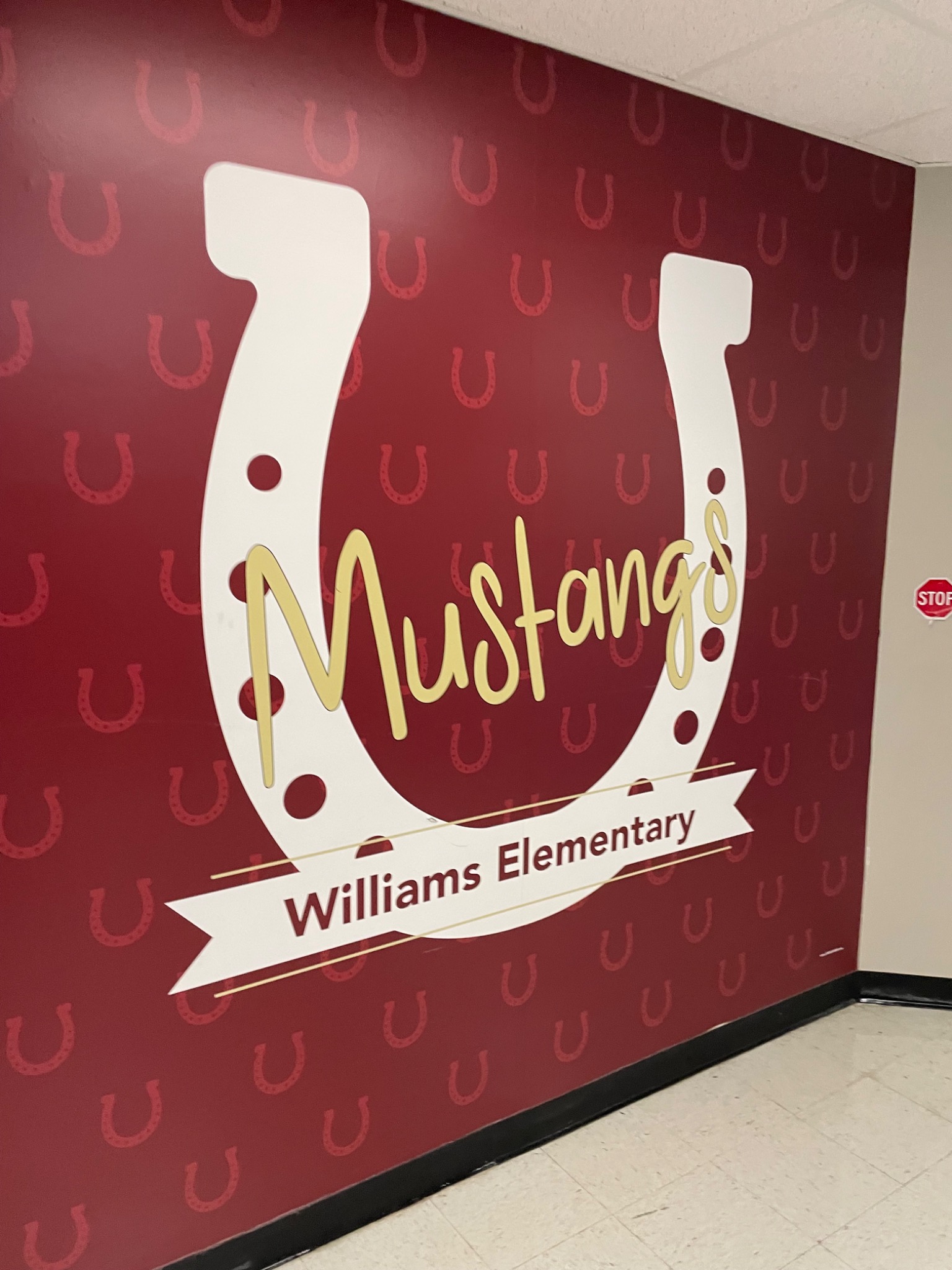 Williams Elementary Mustangs horseshoe mural inside the school